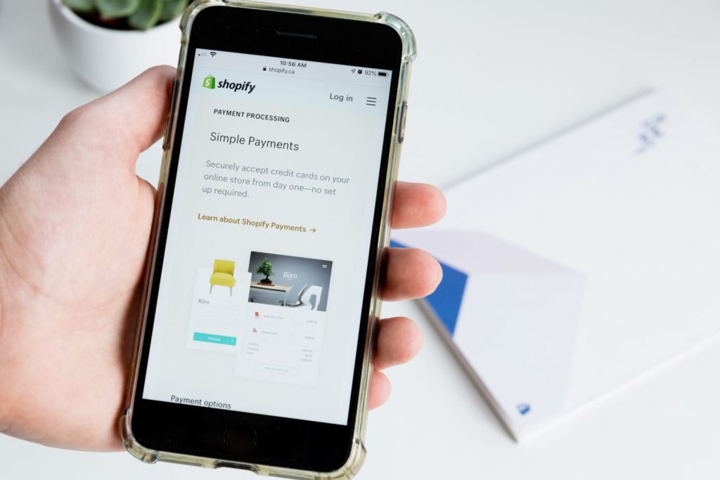 smartphone showing Spotify ecommerce platform