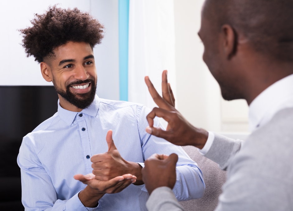 Men conversing in sign language